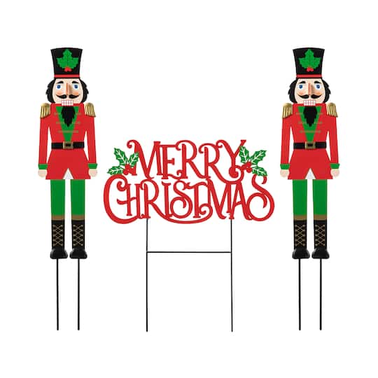 Glitzhome® Metal Nutcrackers & "MERRY CHRISTMAS" Yard Stake Set